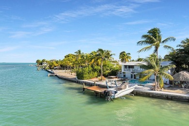 Welcome to 166 Bayview Drive, a rare bayfront estate in the - photo 11