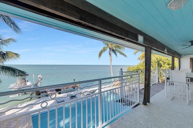 Welcome to 166 Bayview Drive, a rare bayfront estate in the - photo 14