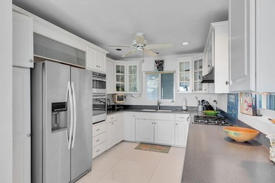 Welcome to 166 Bayview Drive, a rare bayfront estate in the - photo 16