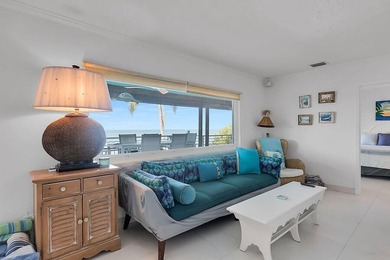 Welcome to 166 Bayview Drive, a rare bayfront estate in the - photo 19