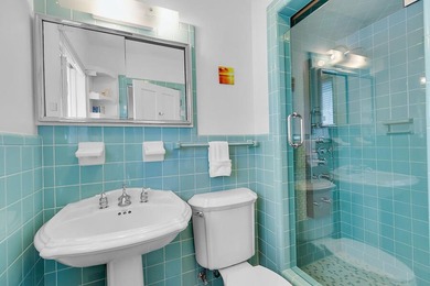 Welcome to 166 Bayview Drive, a rare bayfront estate in the - photo 22
