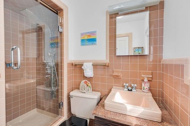 Welcome to 166 Bayview Drive, a rare bayfront estate in the - photo 25