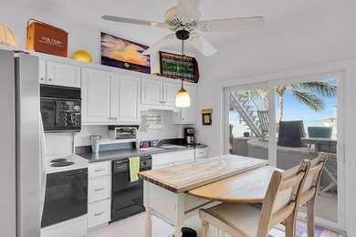 Welcome to 166 Bayview Drive, a rare bayfront estate in the - photo 26