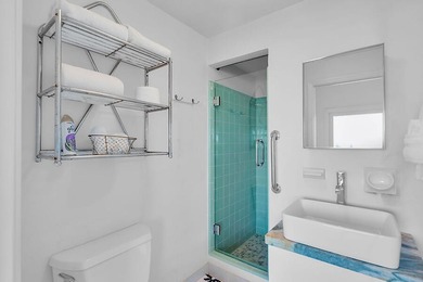 Welcome to 166 Bayview Drive, a rare bayfront estate in the - photo 28