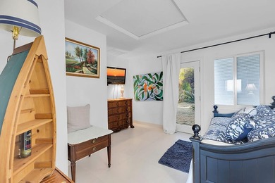 Welcome to 166 Bayview Drive, a rare bayfront estate in the - photo 29