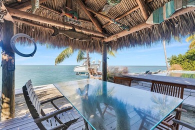 Welcome to 166 Bayview Drive, a rare bayfront estate in the - photo 34