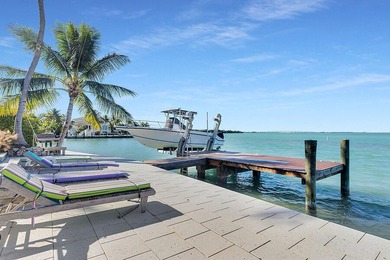 Welcome to 166 Bayview Drive, a rare bayfront estate in the - photo 35