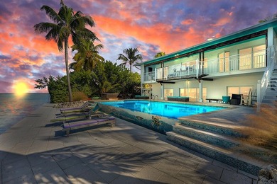 Welcome to 166 Bayview Drive, a rare bayfront estate in the - photo 37