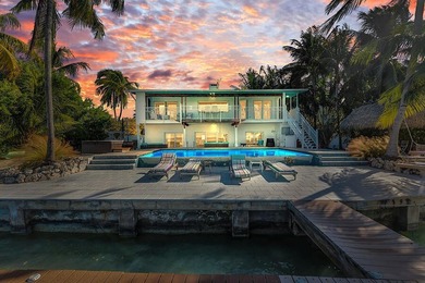 Welcome to 166 Bayview Drive, a rare bayfront estate in the - photo 38