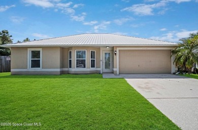 Situated on a quiet street in a desirable Southeast Palm Bay - photo 3