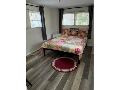 This home is located in a 55+ Community.   Situated on the Chain - photo 13