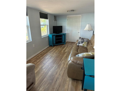 This home is located in a 55+ Community.   Situated on the Chain - photo 14