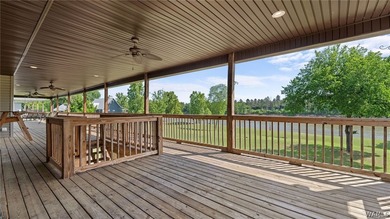 Nestled on almost 4 acres, this 3-bedroom, 2-bath home offers - photo 3