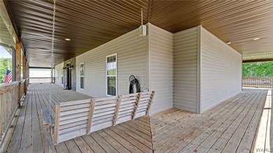 Nestled on almost 4 acres, this 3-bedroom, 2-bath home offers - photo 10