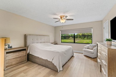 Spacious 2BR/2BA ground-floor partially furnished unit with - photo 21