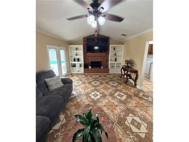 Step into this inviting 4 bedroom, 2 bath home tucked away on a - photo 3