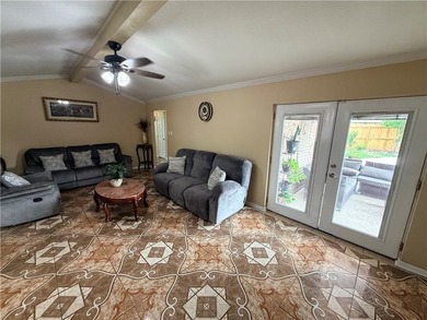 Step into this inviting 4 bedroom, 2 bath home tucked away on a - photo 6