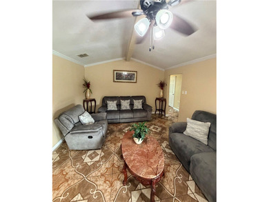 Step into this inviting 4 bedroom, 2 bath home tucked away on a - photo 8