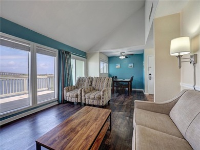 Positioned on the second floor, this waterfront retreat captures - photo 5
