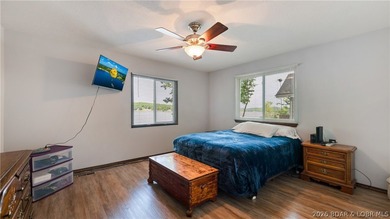 Located at the 43 MM, this lakefront property offers 75' of - photo 12