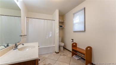 Located at the 43 MM, this lakefront property offers 75' of - photo 14