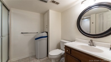 Located at the 43 MM, this lakefront property offers 75' of - photo 16