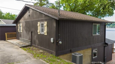 Located at the 43 MM, this lakefront property offers 75' of - photo 26