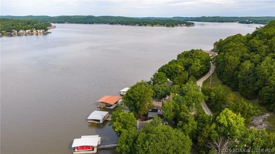 Located at the 43 MM, this lakefront property offers 75' of - photo 43