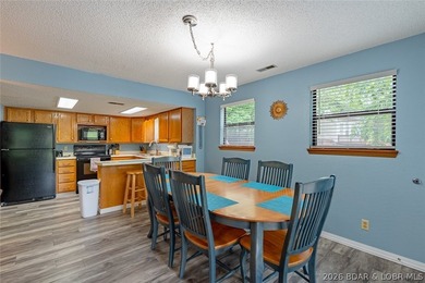 Welcome to lake living at its best! This must-see 3-bedroom - photo 12