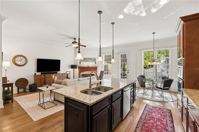 Set behind the gates of One Ivy Walk, this brick townhome offers - photo 13