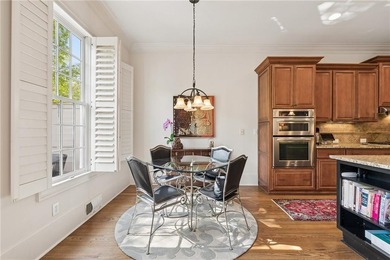 Set behind the gates of One Ivy Walk, this brick townhome offers - photo 15