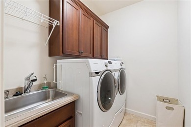 Set behind the gates of One Ivy Walk, this brick townhome offers - photo 30