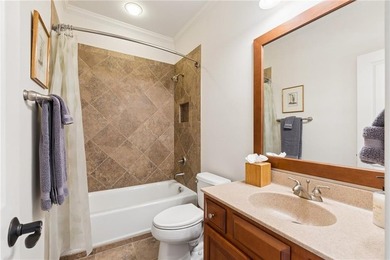 Set behind the gates of One Ivy Walk, this brick townhome offers - photo 37