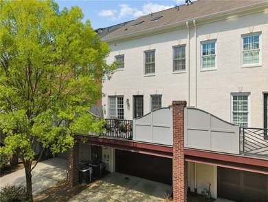 Set behind the gates of One Ivy Walk, this brick townhome offers - photo 41