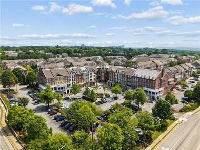 Set behind the gates of One Ivy Walk, this brick townhome offers - photo 46