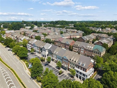 Set behind the gates of One Ivy Walk, this brick townhome offers - photo 47