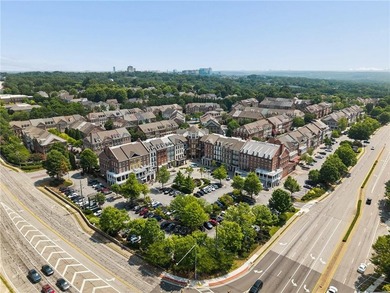Set behind the gates of One Ivy Walk, this brick townhome offers - photo 48
