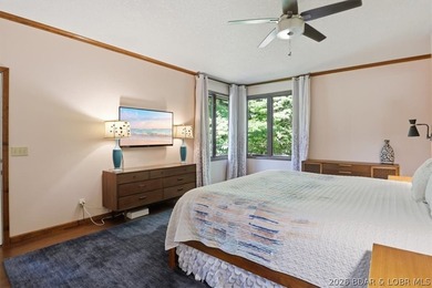 Tucked into the trees on over 8 acres at the 47MM in cove, this - photo 16