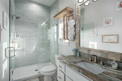 Experience coastal living at its finest in this beautifully - photo 22