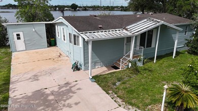 Enjoy relaxed waterfront living in this 2-bedroom, 2-bath - photo 1