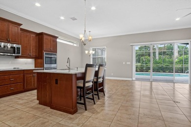 Motivated Seller Beautiful GHO built 3/3/2 pool home with a den - photo 11