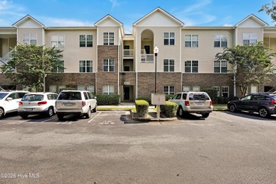 This updated 2-bedroom, 2-bath second-floor condo offers a - photo 3
