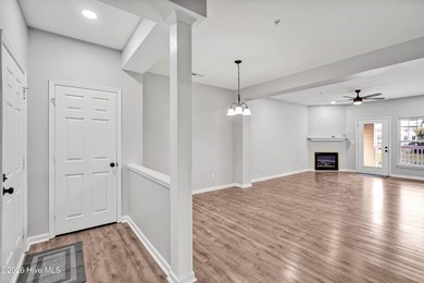This updated 2-bedroom, 2-bath second-floor condo offers a - photo 8