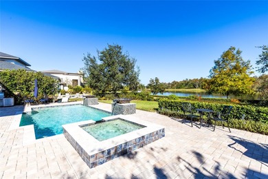 Welcome to this exceptional lakefront residence in Laureate Park - photo 4