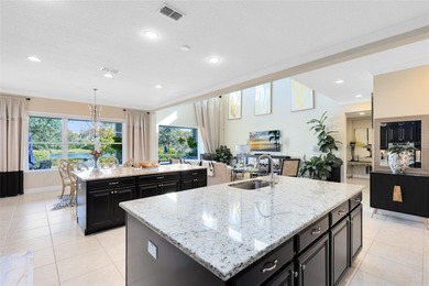 Welcome to this exceptional lakefront residence in Laureate Park - photo 9