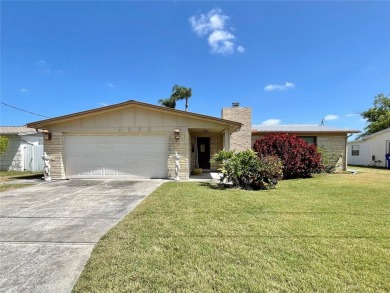 Lake Home For Sale in Holiday, Florida