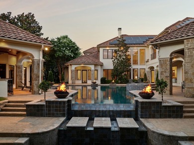 Situated in a prestigious Southlake cul-de-sac, this gated - photo 1