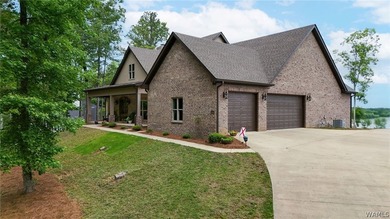 This beautifully crafted 4-bedroom, 3.5-bath brick estate sits - photo 1