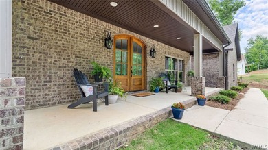 This beautifully crafted 4-bedroom, 3.5-bath brick estate sits - photo 2
