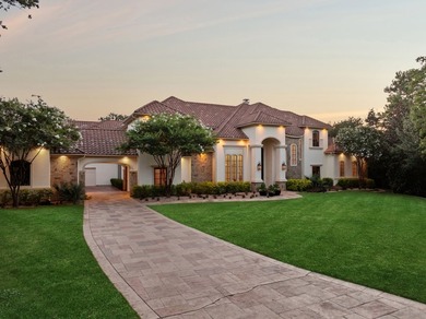 Situated in a prestigious Southlake cul-de-sac, this gated - photo 3